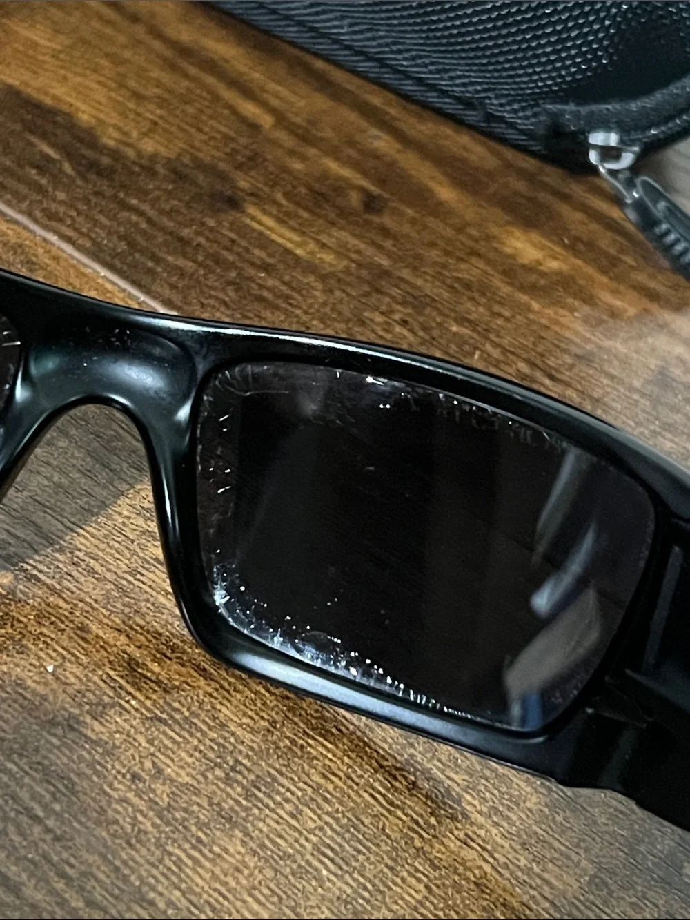 Oakley Black Sunglasses with Dark Lenses